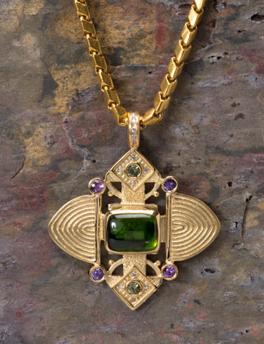 The Golden Eye: Green Tourmaline Ashanti Cross